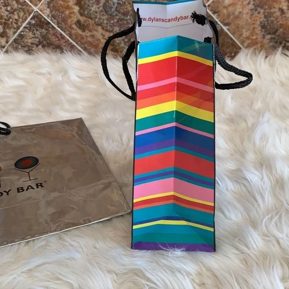 Dylan’s Candy Bar Paper Shopping Bags. One Black and One Silver Metallic.